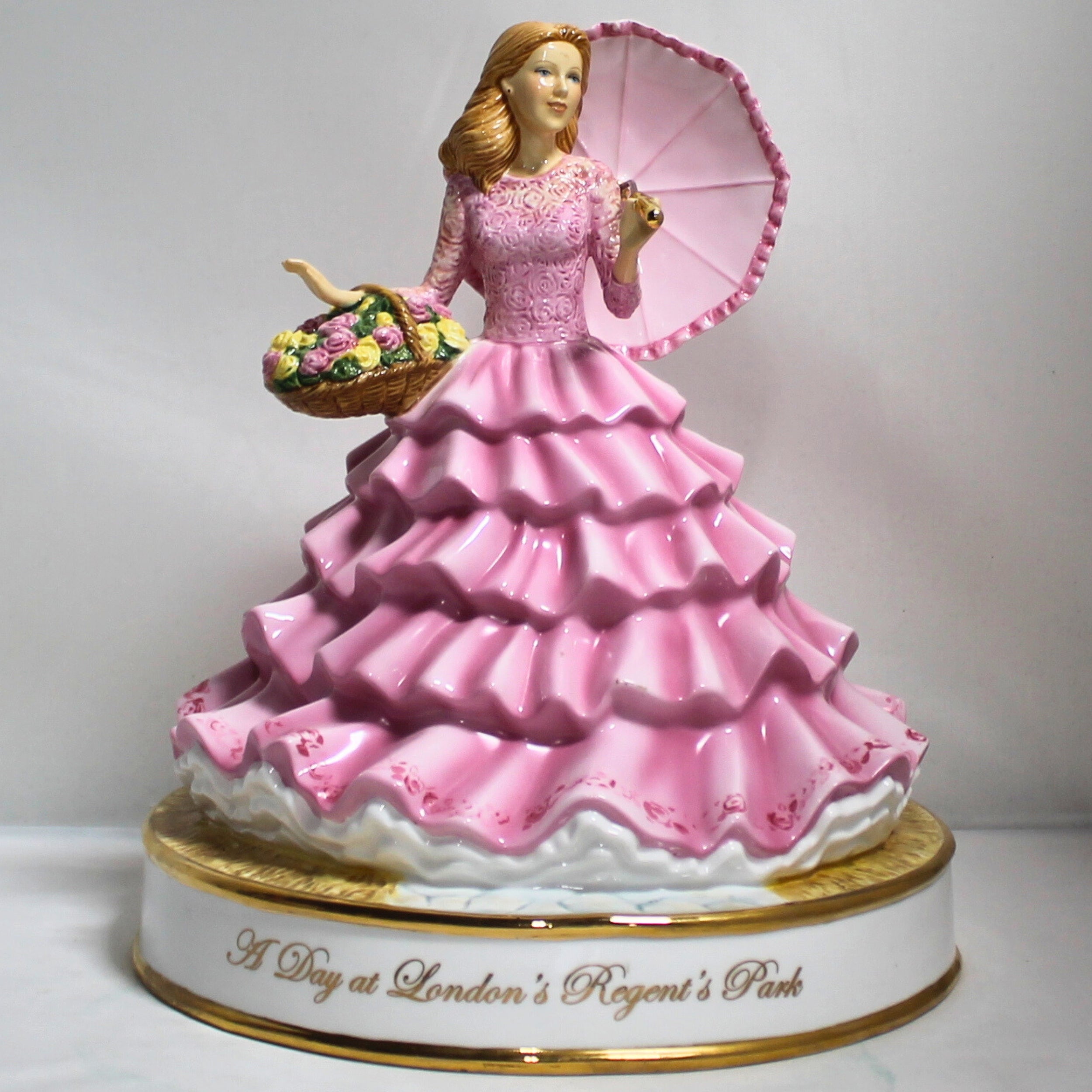 royal doulton figurines pink dress Royal Doulton: A Day at London's Regent's Park Figurine