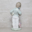 Lladró Figurine: Nao 1044 Boy on Phone with Pupets