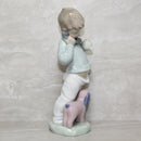Lladró Figurine: Nao 1044 Boy on Phone with Pupets