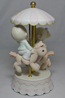 Precious Moments: 139475 Love Makes the World Go 'Round