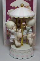 Precious Moments: 139475 Love Makes the World Go 'Round