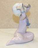 Lladró Figurine: 5100 Baby with Pacifier Yawning