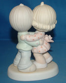 Precious Moments: 521299 Hug One Another