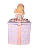 Precious Moments 699950L, Girl with Cake covered box