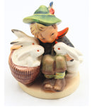 Hummel figurines "Playmates" and "Girl with Doll"