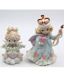 Precious Moments Figurines " You are the queen of my heart" and "All wrapped up with love"