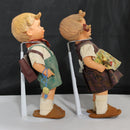 Lot of 2: 12" Hummel Plastic Dolls Schoolboy  + Unknown