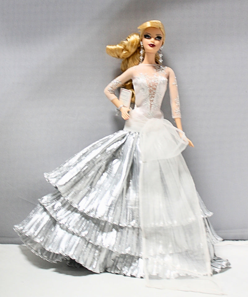 Lot of 4: Holiday Barbies