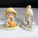 Lot of 2: Precious Moments, Wonder-Fall Day, Love Grows Where You Plant It