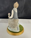Lladro Girl Gathering Flowers