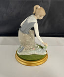 Lladro Girl Gathering Flowers