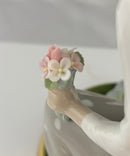 Lladro Girl Gathering Flowers