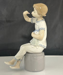 Lladro Seated Girl Holding Doll Porcelain Figurine Blue White Doll Head Cracked