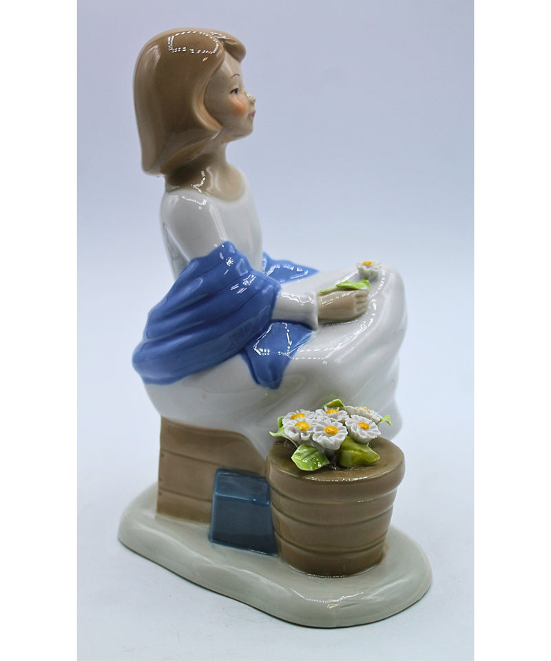 Woman with Flowers Figurine | Broken Leaf