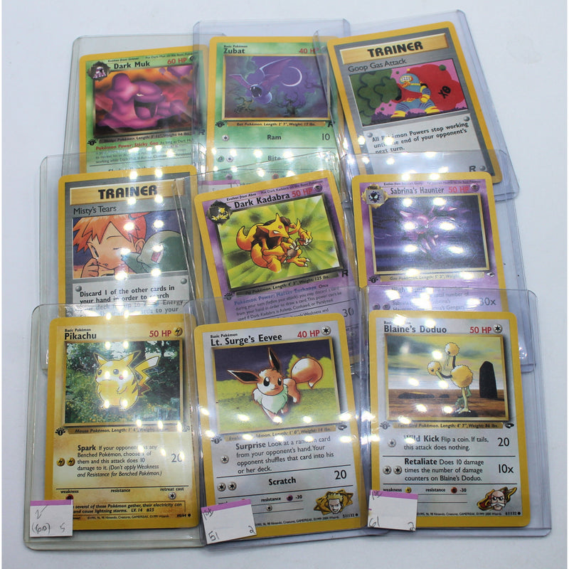 Random Lot of 50: 1st Edition Pokemon Cards in  Sleeves