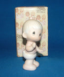 Precious Moments: E-2852B Baby Girl Standing with Bow