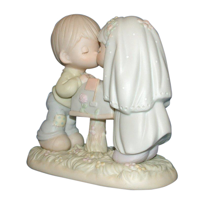 Precious Moments Figurine: 524441 Sealed with a Kiss