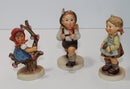 Hummel Figurine Lot Apple Tree Girl, School Boy, Flower Girl  (AP 1590 )