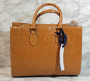 Dooney & Bourke Purse: Brown Embossed Logo Shoulder Bag